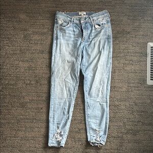 Women's Light Blue Distressed Jeans